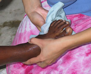 foot washing black child